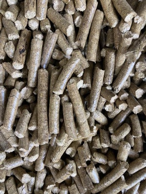Palletised wood pellet bags prepared for container export from Portugal